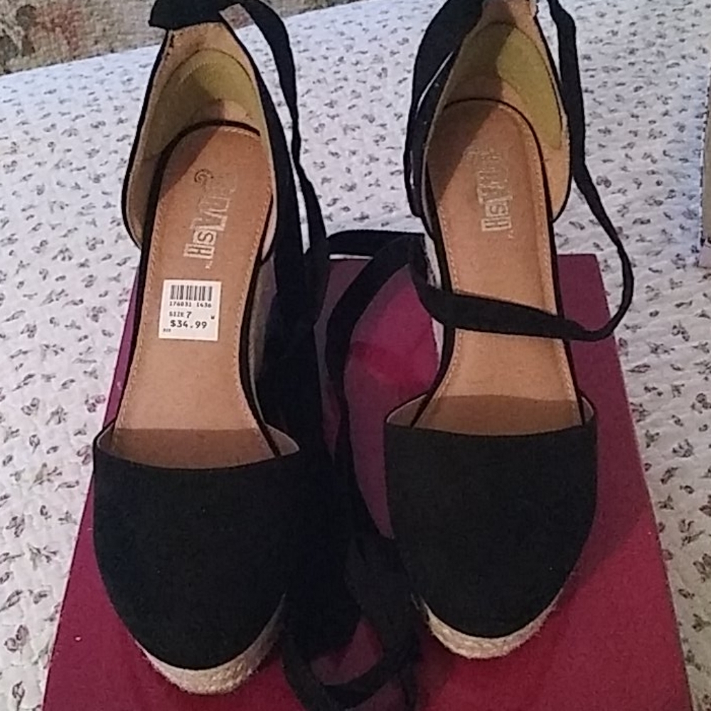 Womens black and tan shoes.